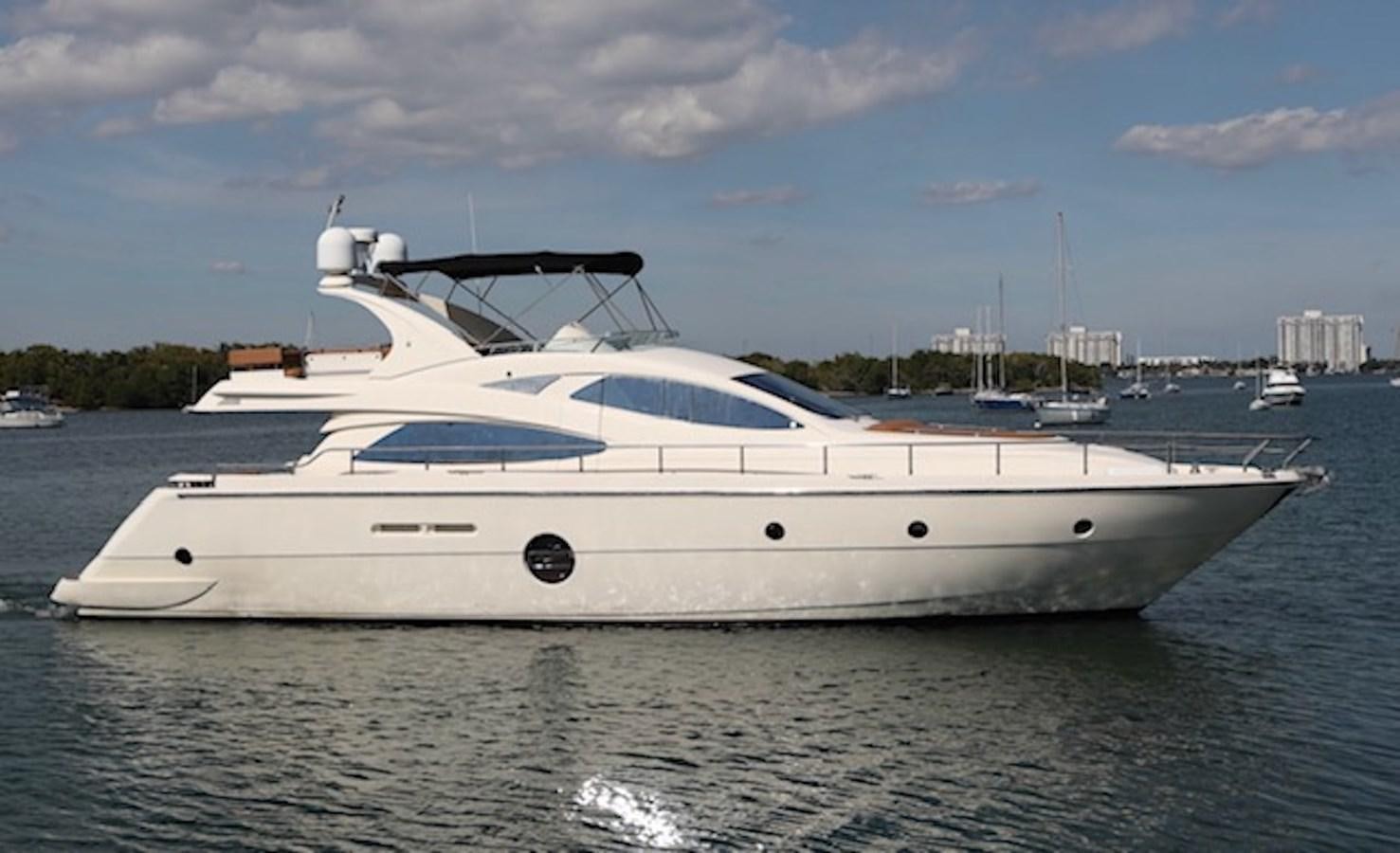 a white yacht in the water aboard K3 Yacht for Sale