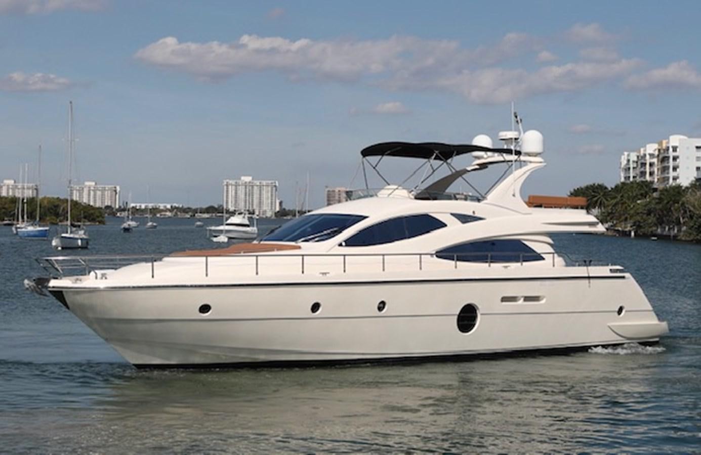 a white yacht in the water aboard K3 Yacht for Sale