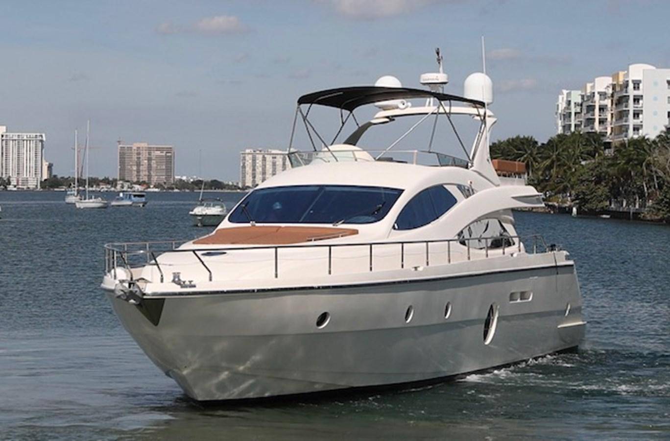 a white yacht in the water aboard K3 Yacht for Sale