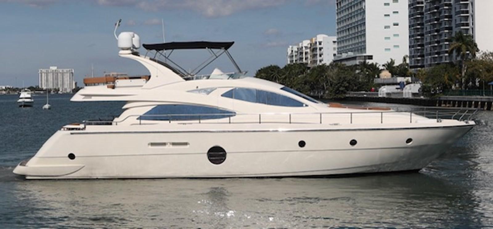 a white yacht in the water aboard K3 Yacht for Sale