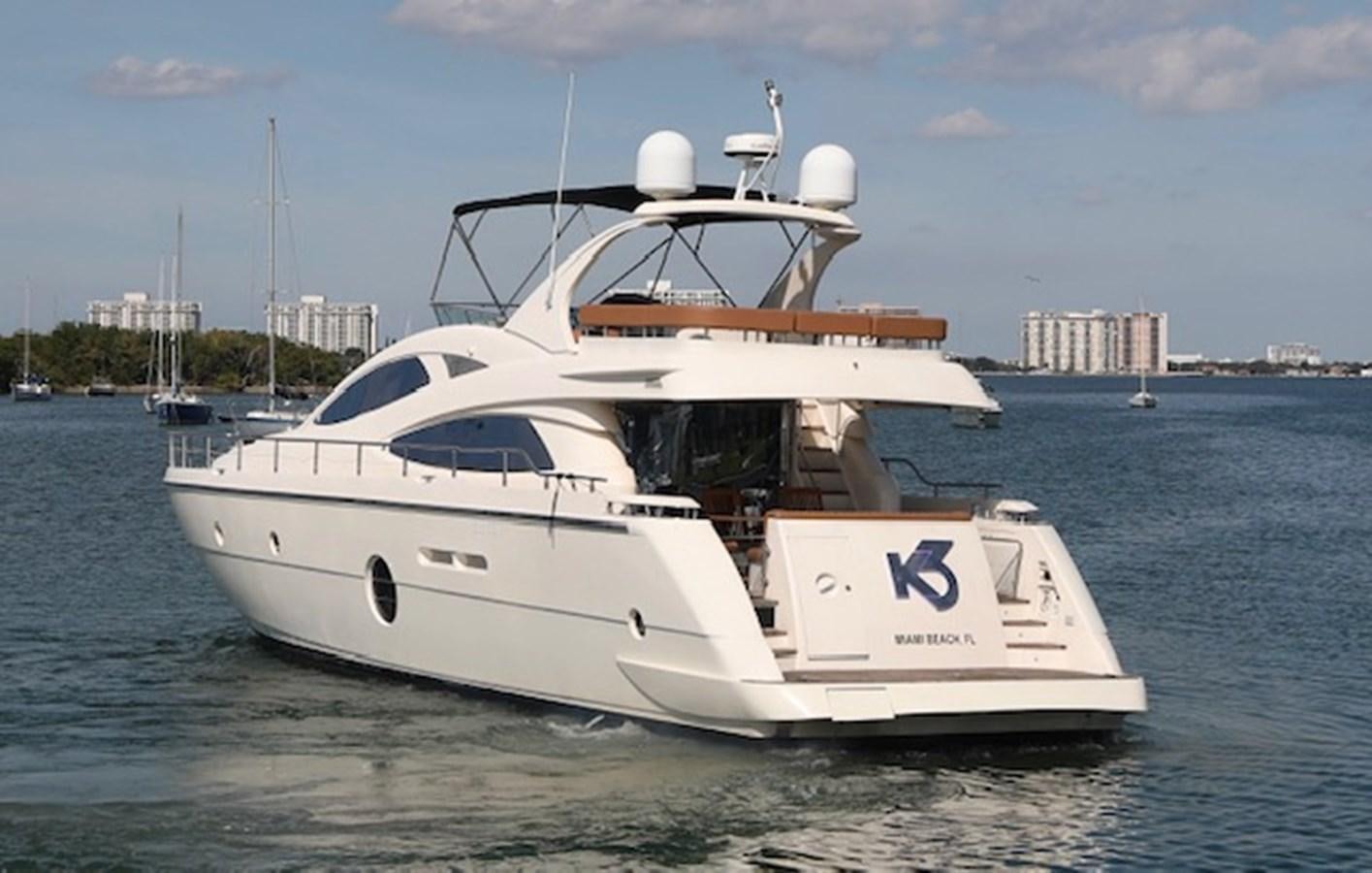 a white yacht in the water aboard K3 Yacht for Sale