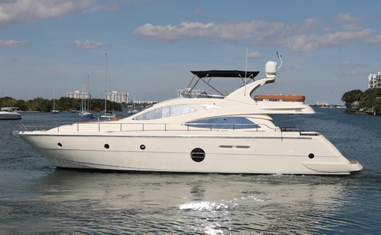 a white yacht on the water aboard K3 Yacht for Sale