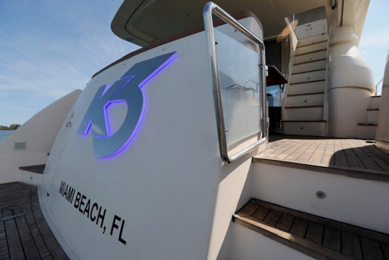 a large white box with a purple logo on it aboard K3 Yacht for Sale