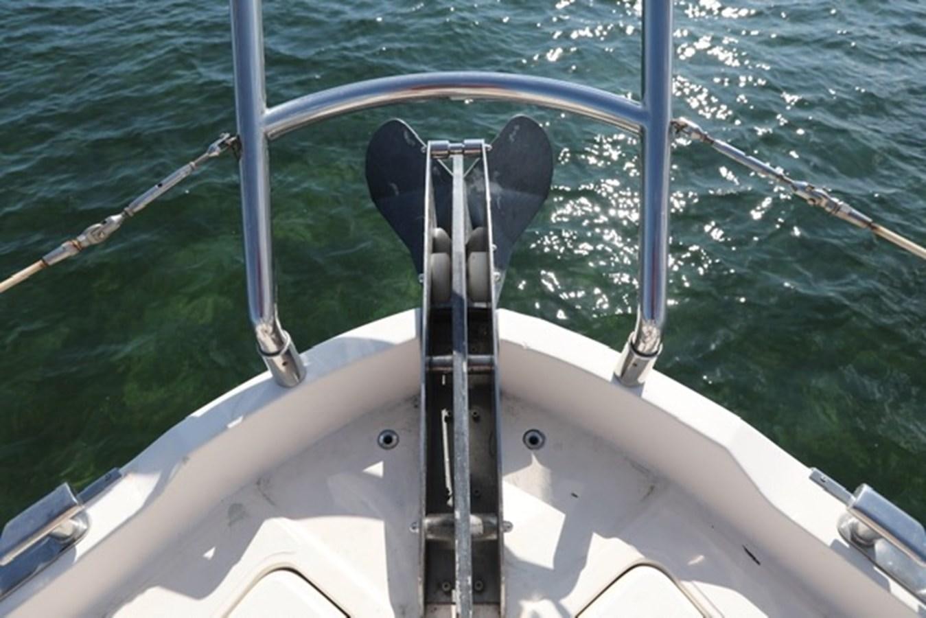 a boat with a steering wheel aboard K3 Yacht for Sale