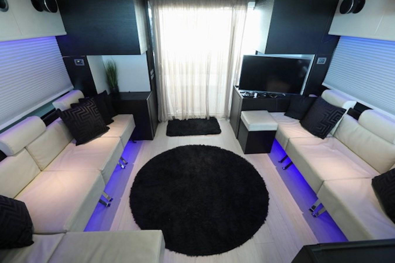 a room with a bed and a tv aboard K3 Yacht for Sale