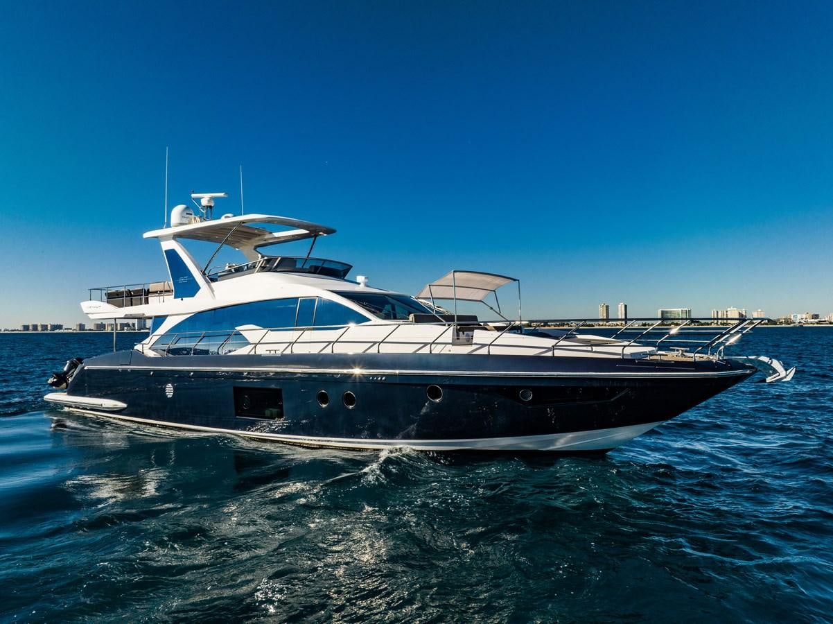 a large white boat in the water aboard KNOT DIVORCE Yacht for Sale