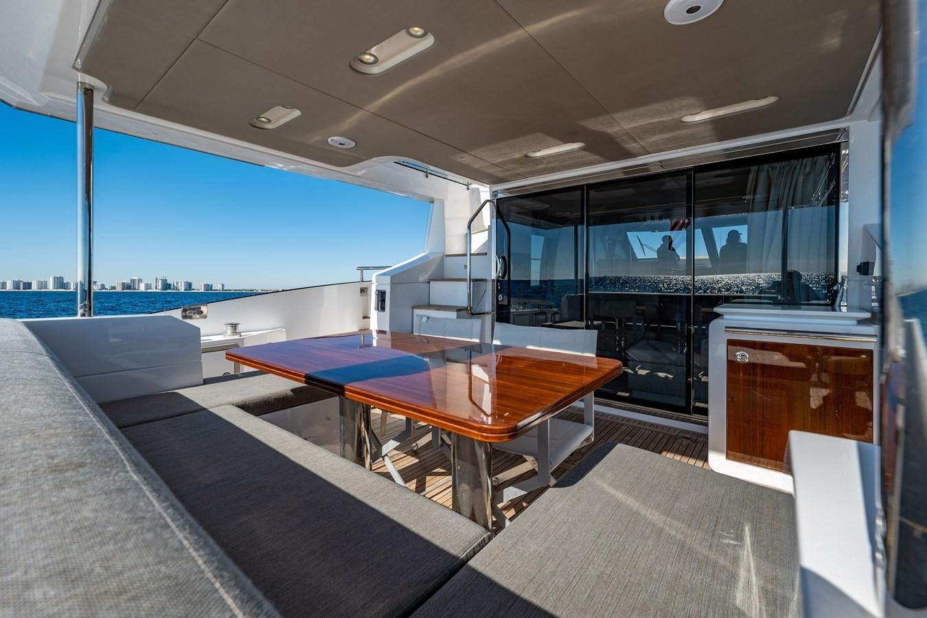 a room with a table and chairs aboard KNOT DIVORCE Yacht for Sale