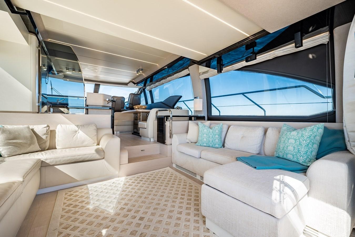 a room with a couch and a table aboard KNOT DIVORCE Yacht for Sale