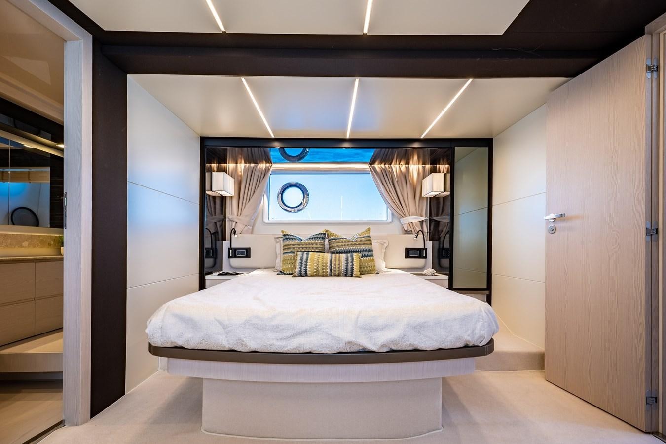 a bedroom with a bed aboard KNOT DIVORCE Yacht for Sale