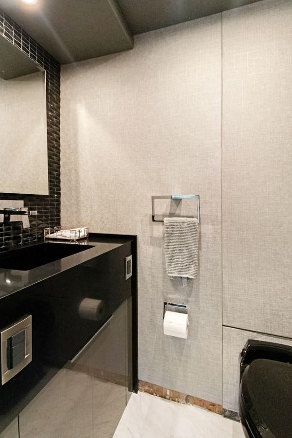 a bathroom with a sink and a mirror aboard MAC Yacht for Sale