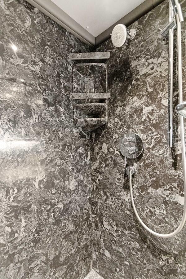 a large room with a large hole in the wall aboard MAC Yacht for Sale