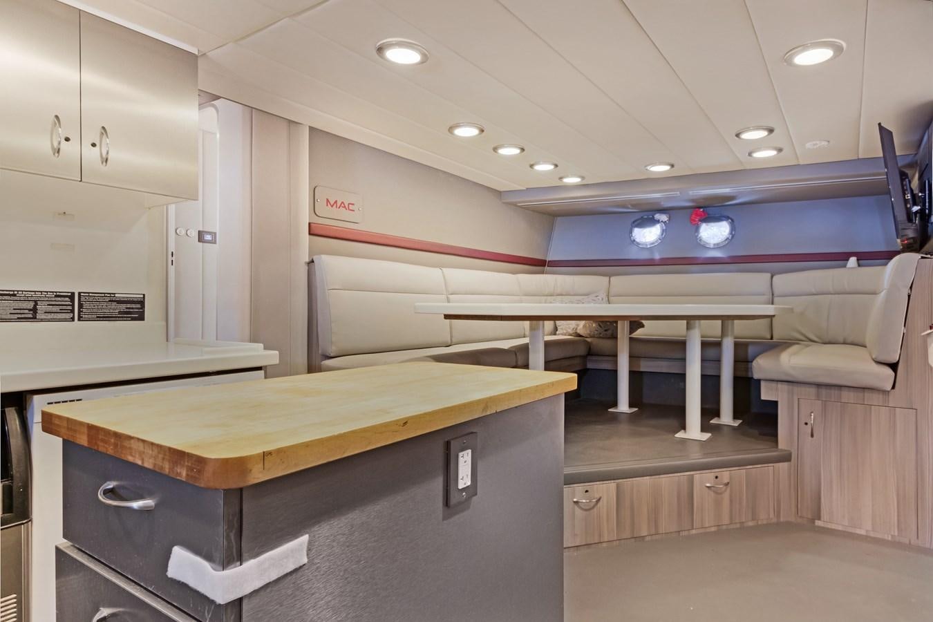 a room with a desk and a chair aboard MAC Yacht for Sale