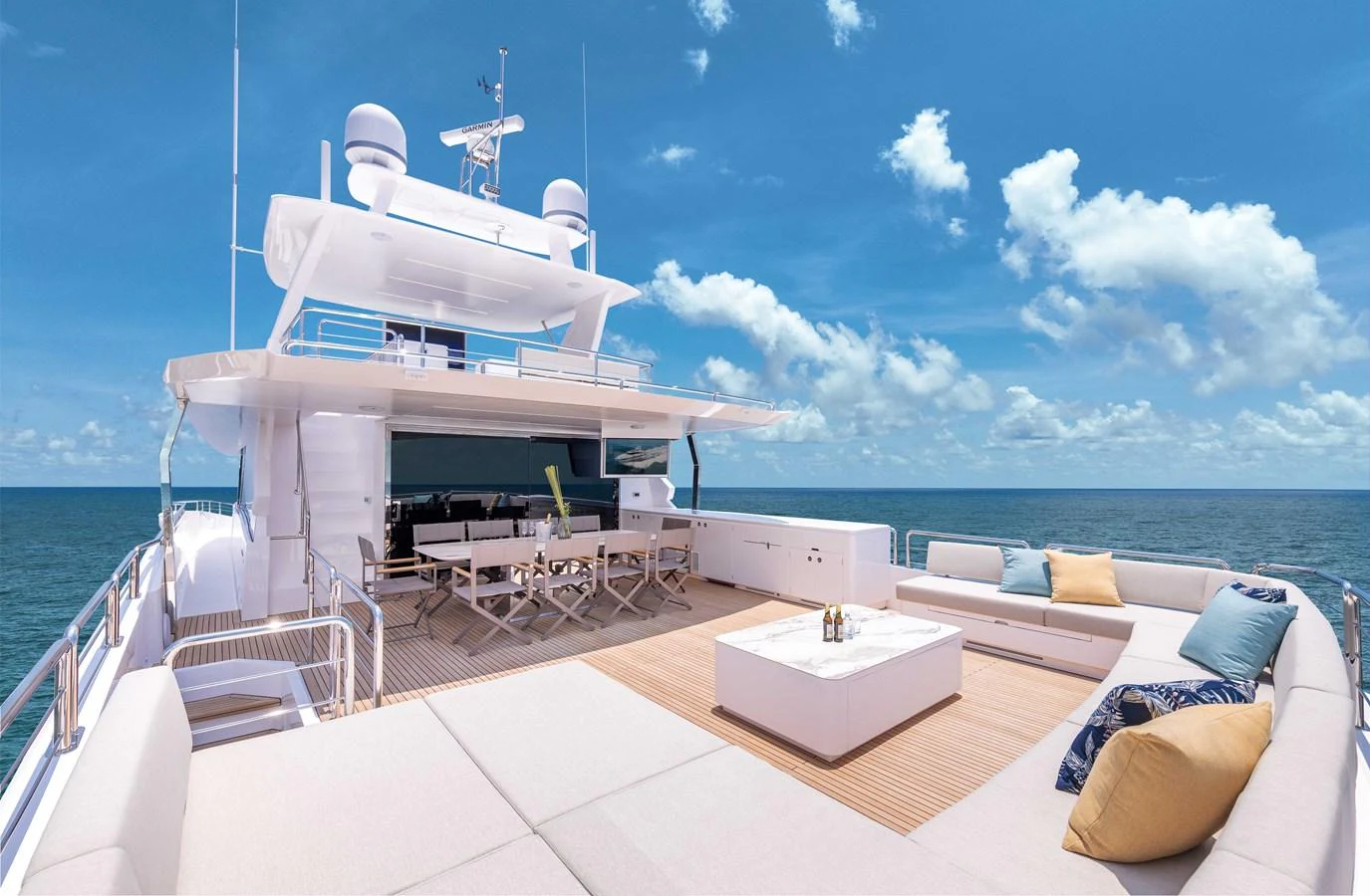 a large white boat on a body of water aboard HORIZON FD100/911 Yacht for Sale