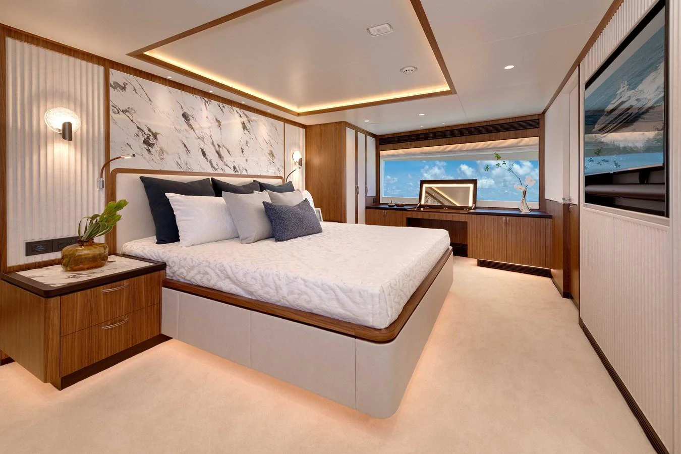 a large bedroom with a large bed aboard HORIZON FD100/911 Yacht for Sale