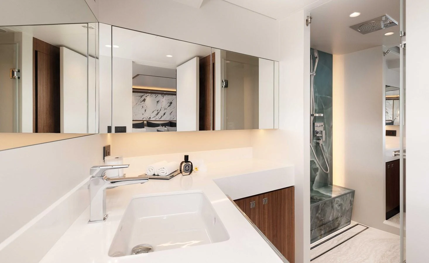 a bathroom with a large mirror aboard HORIZON FD100/911 Yacht for Sale