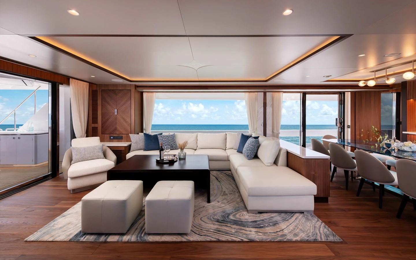 a living room with a large window aboard HORIZON FD100/911 Yacht for Sale