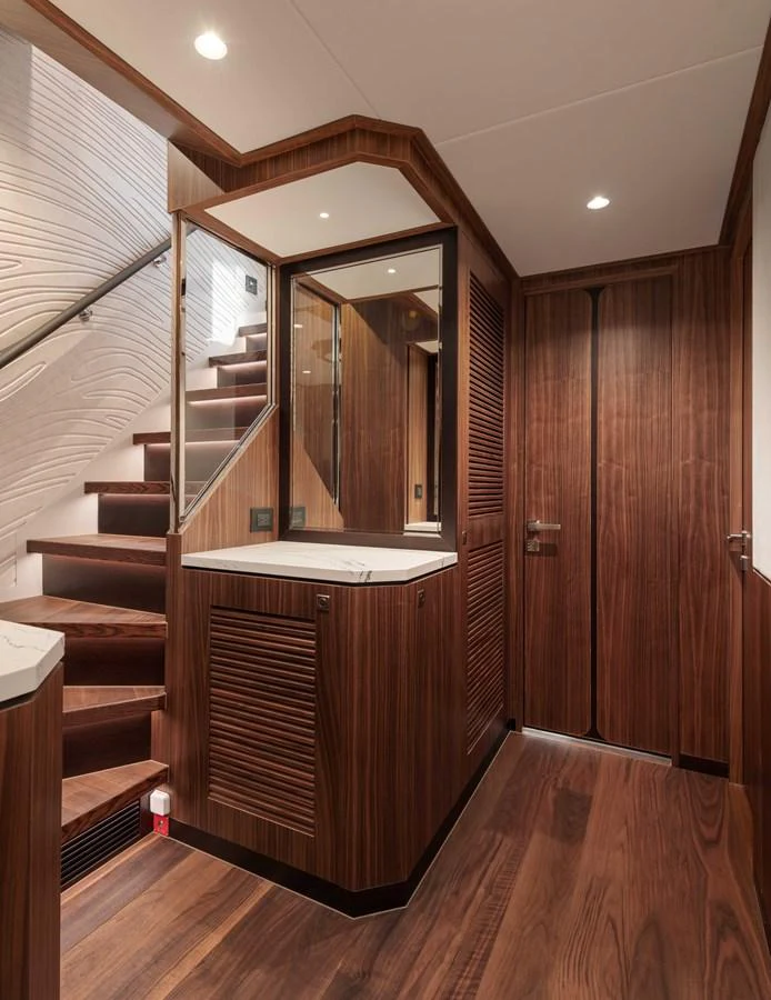 a large mirror in a room aboard HORIZON FD100/911 Yacht for Sale