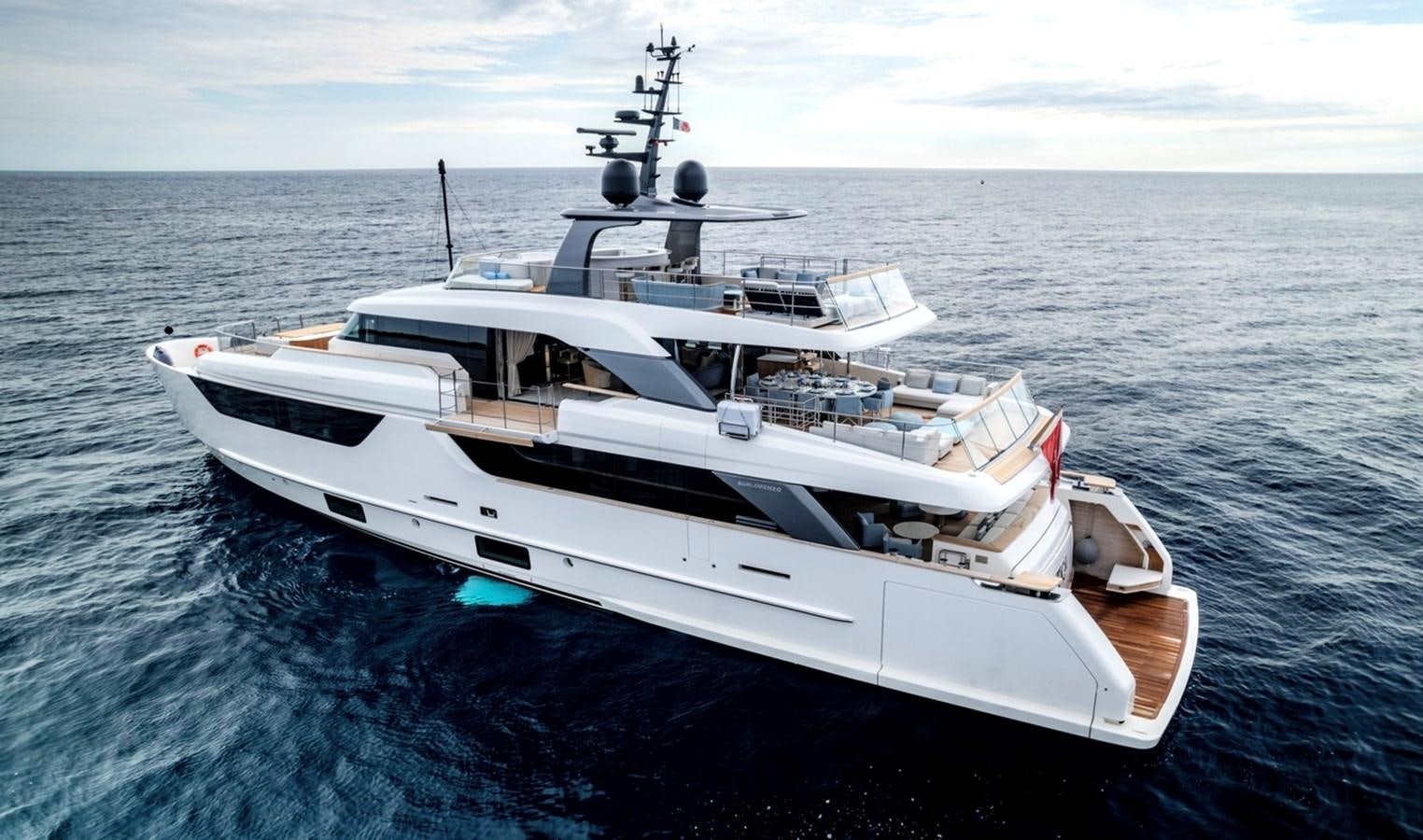 a white yacht on the water aboard INS LAND Yacht for Sale