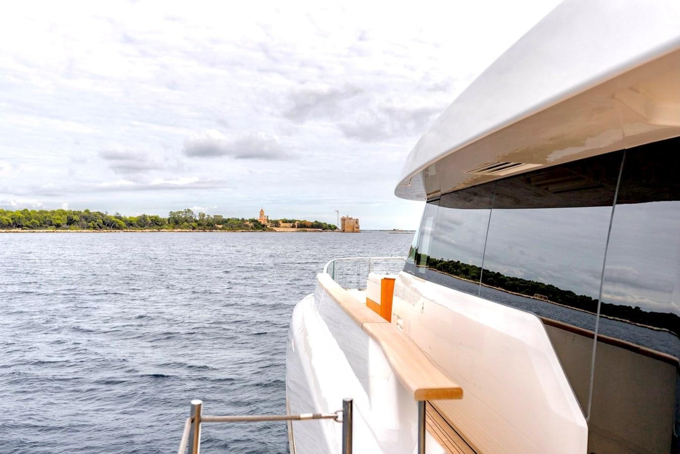 a boat on the water aboard INS LAND Yacht for Sale
