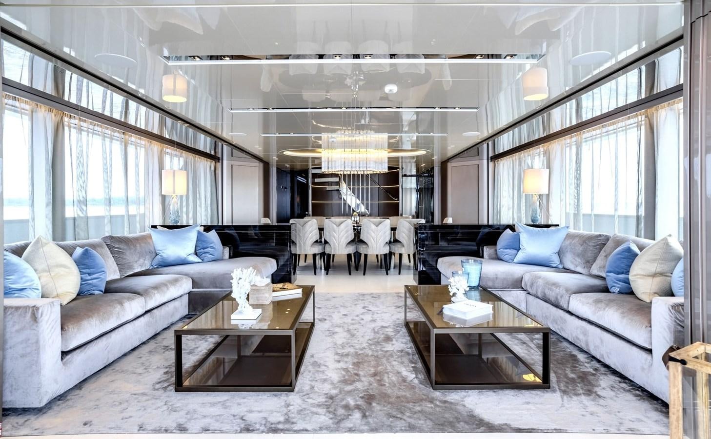 a living room with a large window aboard INS LAND Yacht for Sale