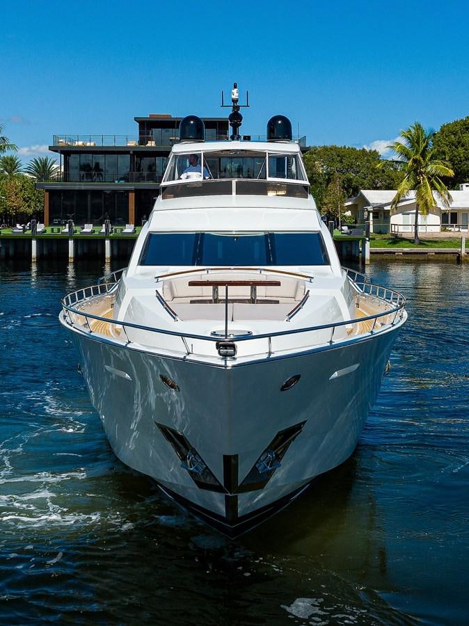 a white boat in the water aboard ALGORYTHM Yacht for Sale