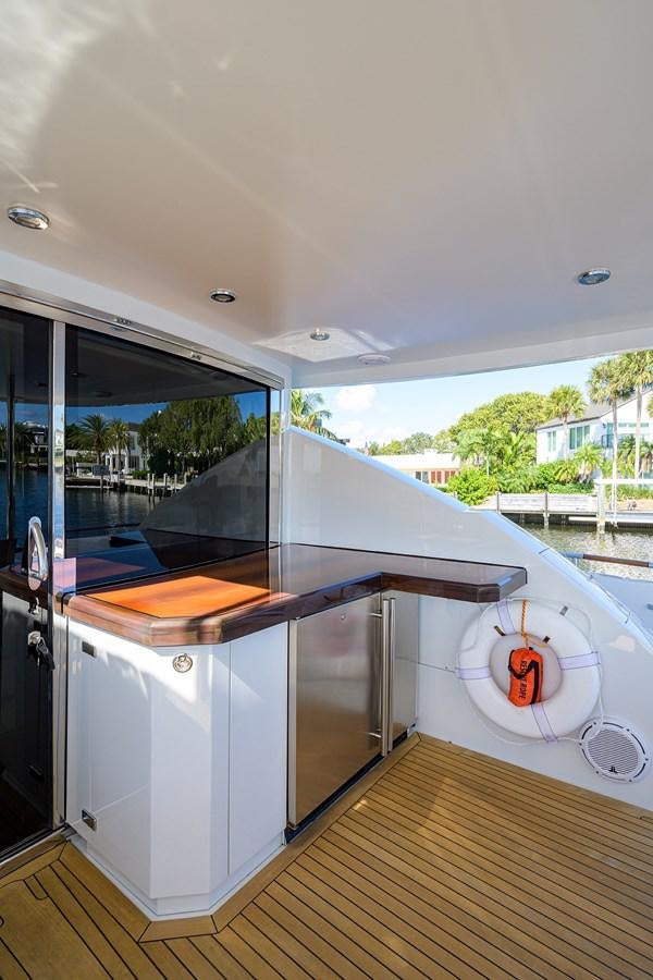 a kitchen with a large window aboard ALGORYTHM Yacht for Sale