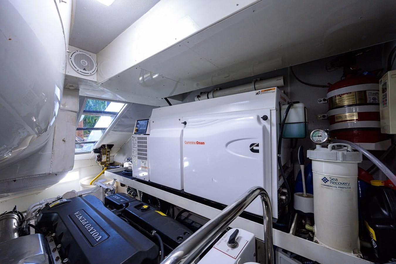 a white machine with a large white cylinder on the side aboard ALGORYTHM Yacht for Sale