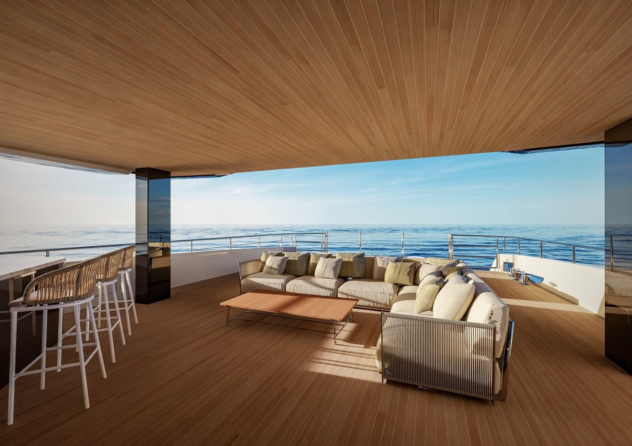 a living room with a large balcony overlooking the ocean aboard PICCOLO Yacht for Sale