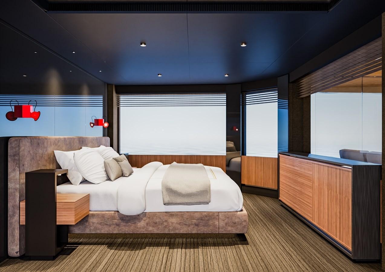a bedroom with a bed and a desk aboard PICCOLO Yacht for Sale