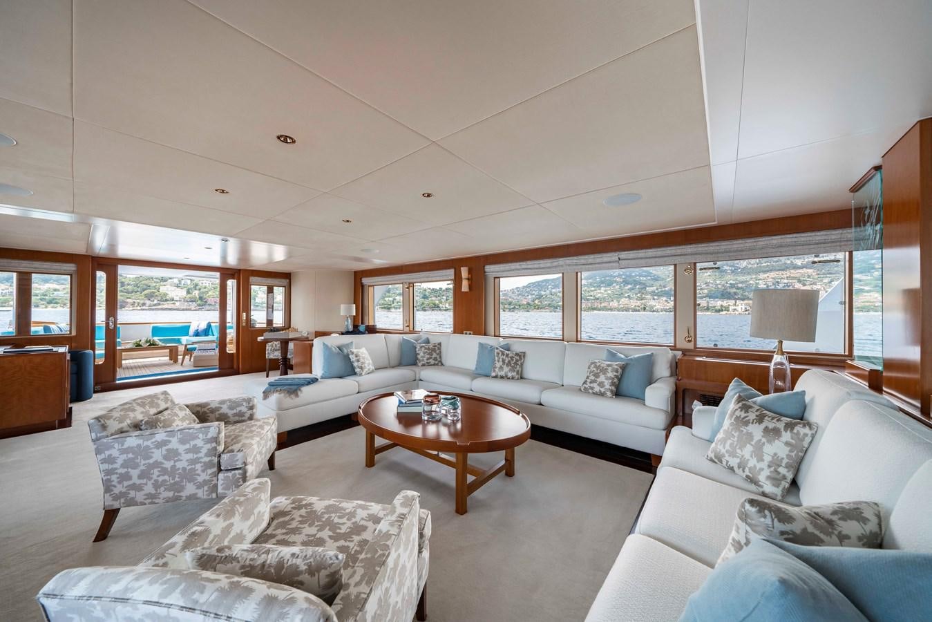 a living room with a large window aboard SYNTHESIS 66 Yacht for Sale