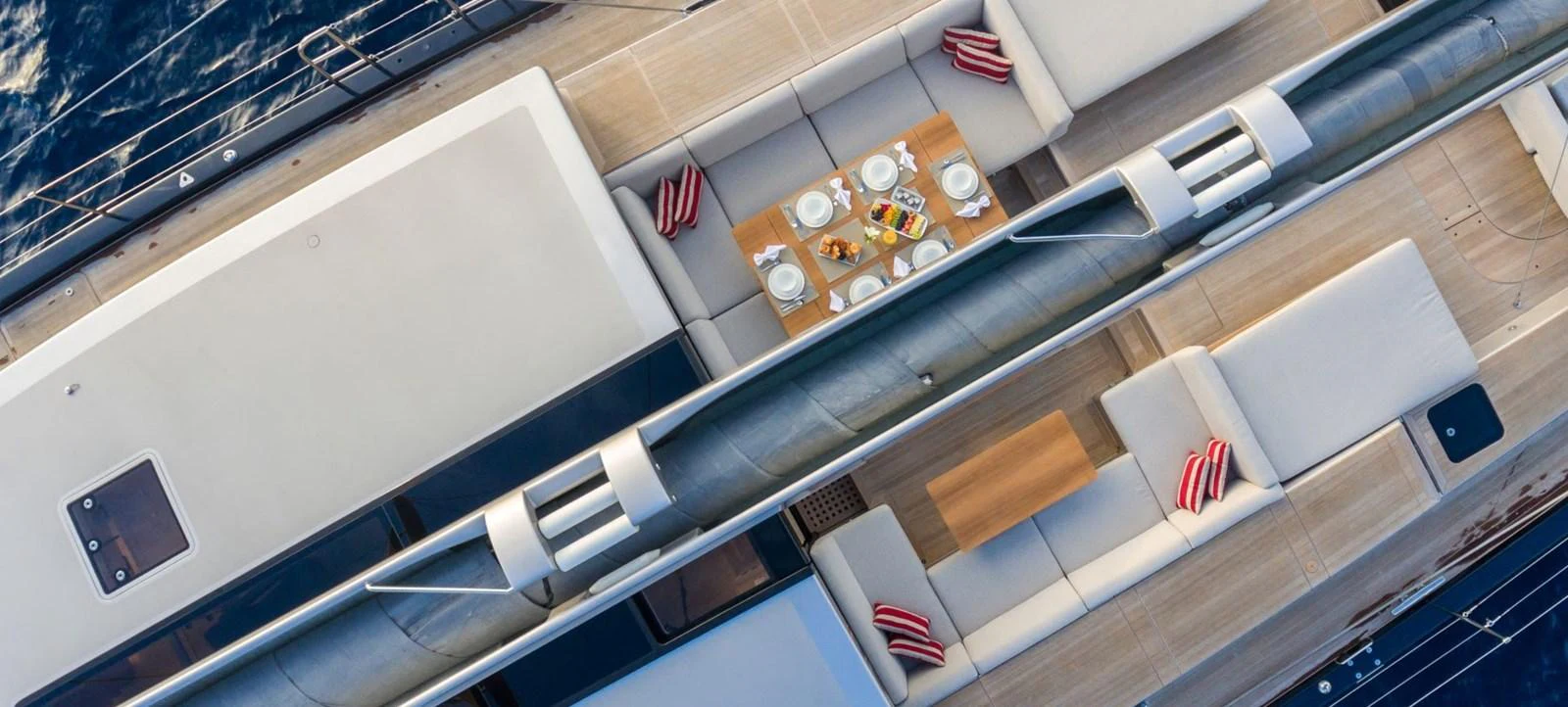 a white counter top with red and silver objects on it aboard G2 Yacht for Sale