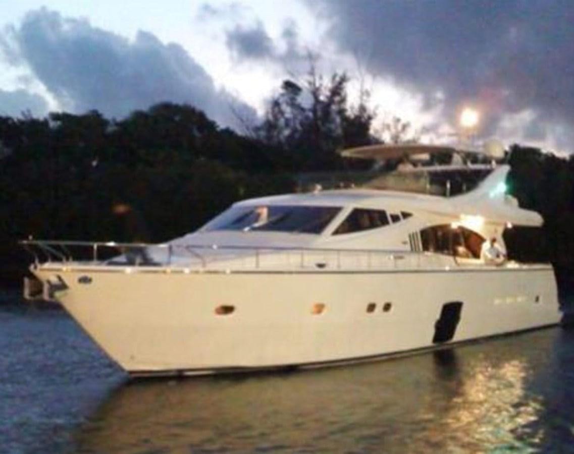 a white boat on a river aboard SEDROP - 2006 FERRETTI 731 @ PTO. AVENTURAS Yacht for Sale