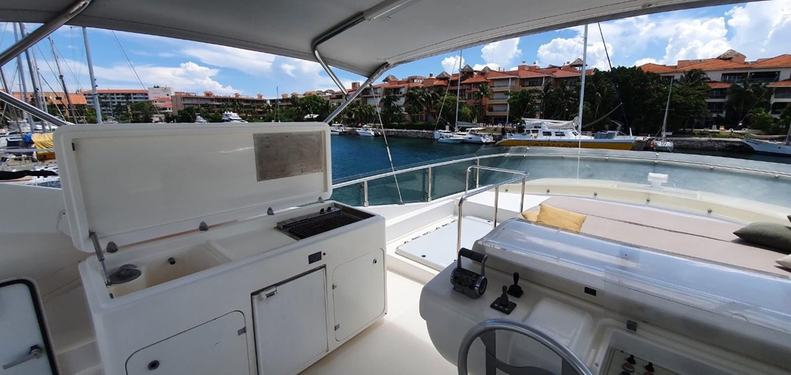 a boat on the water aboard SEDROP - 2006 FERRETTI 731 @ PTO. AVENTURAS Yacht for Sale