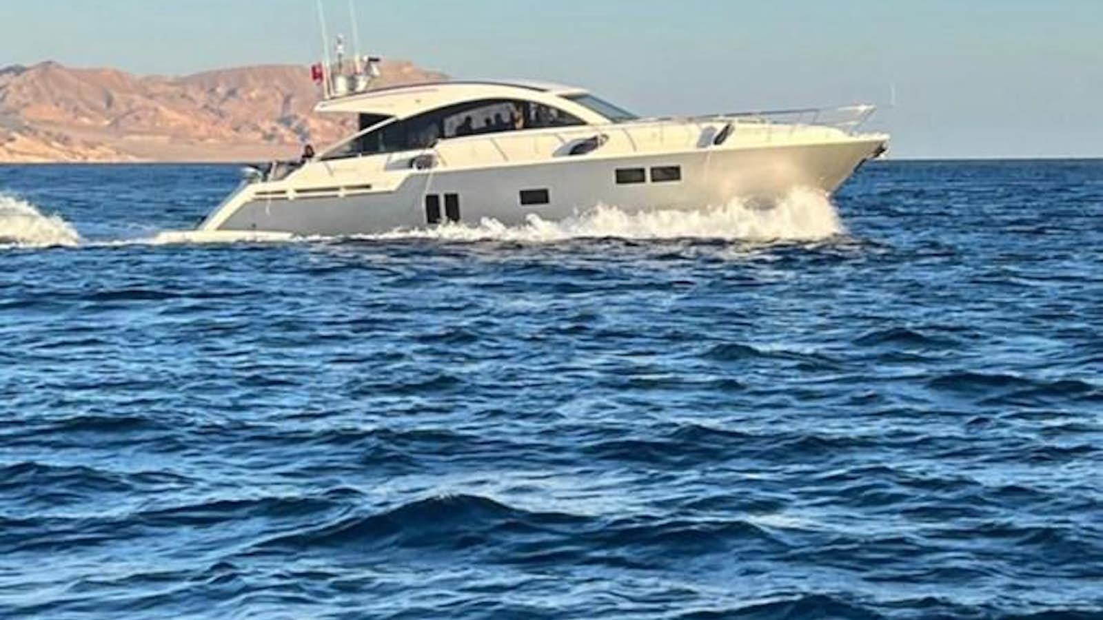 a boat in the water aboard M/Y KAYAN Yacht for Sale
