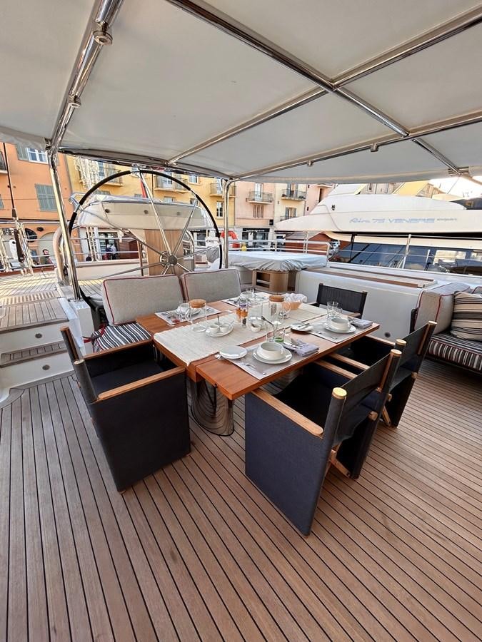 a dining table in a restaurant aboard STATE OF GRACE Yacht for Charter