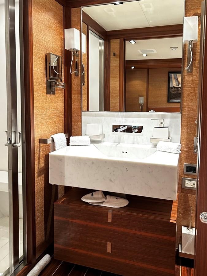 a bathroom with a large mirror aboard STATE OF GRACE Yacht for Charter