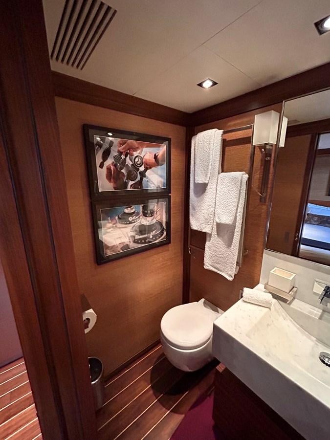a bathroom with a sink and a toilet aboard STATE OF GRACE Yacht for Charter