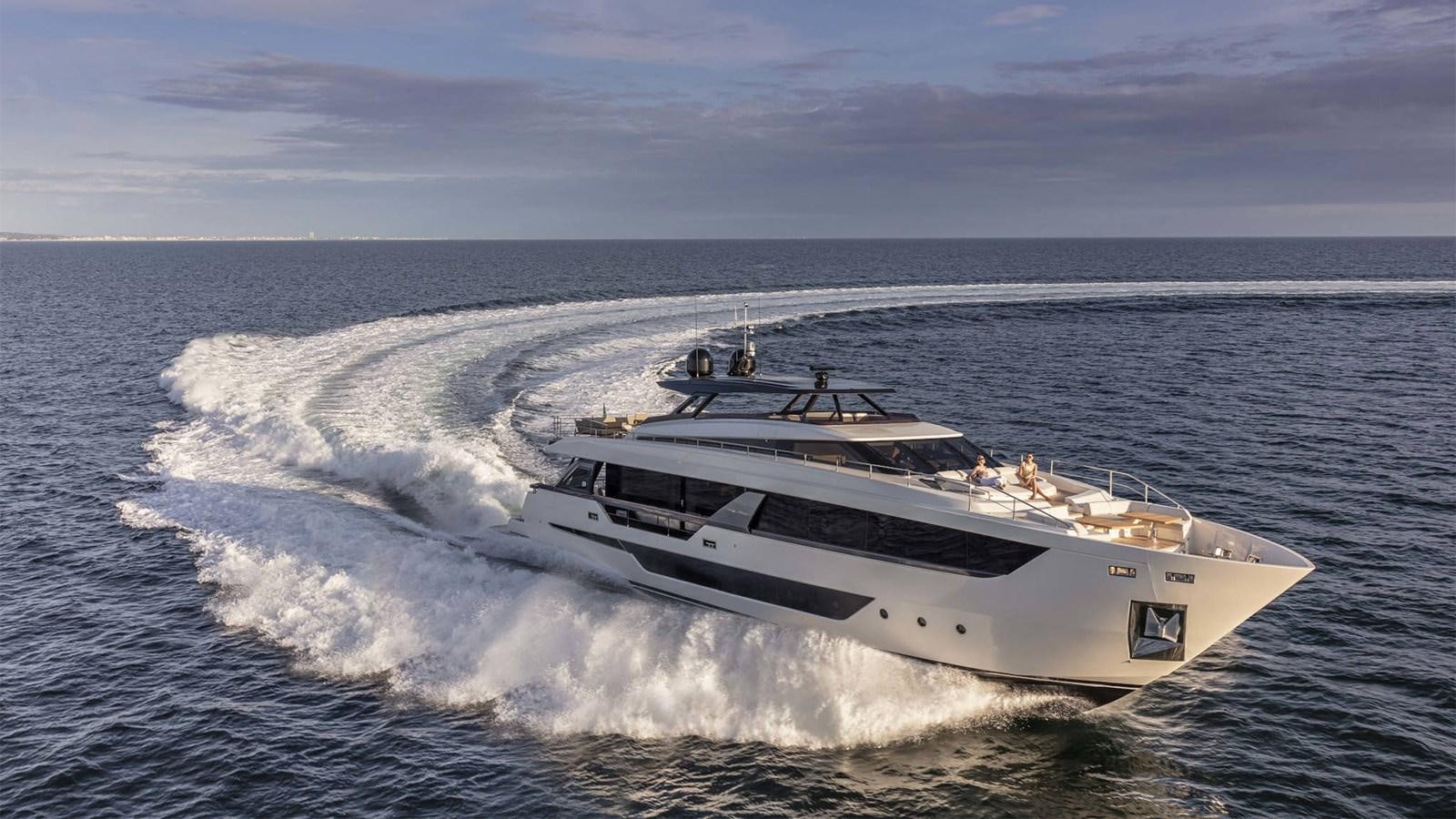 a white boat on the water aboard FERRETTI 1000 Yacht for Sale