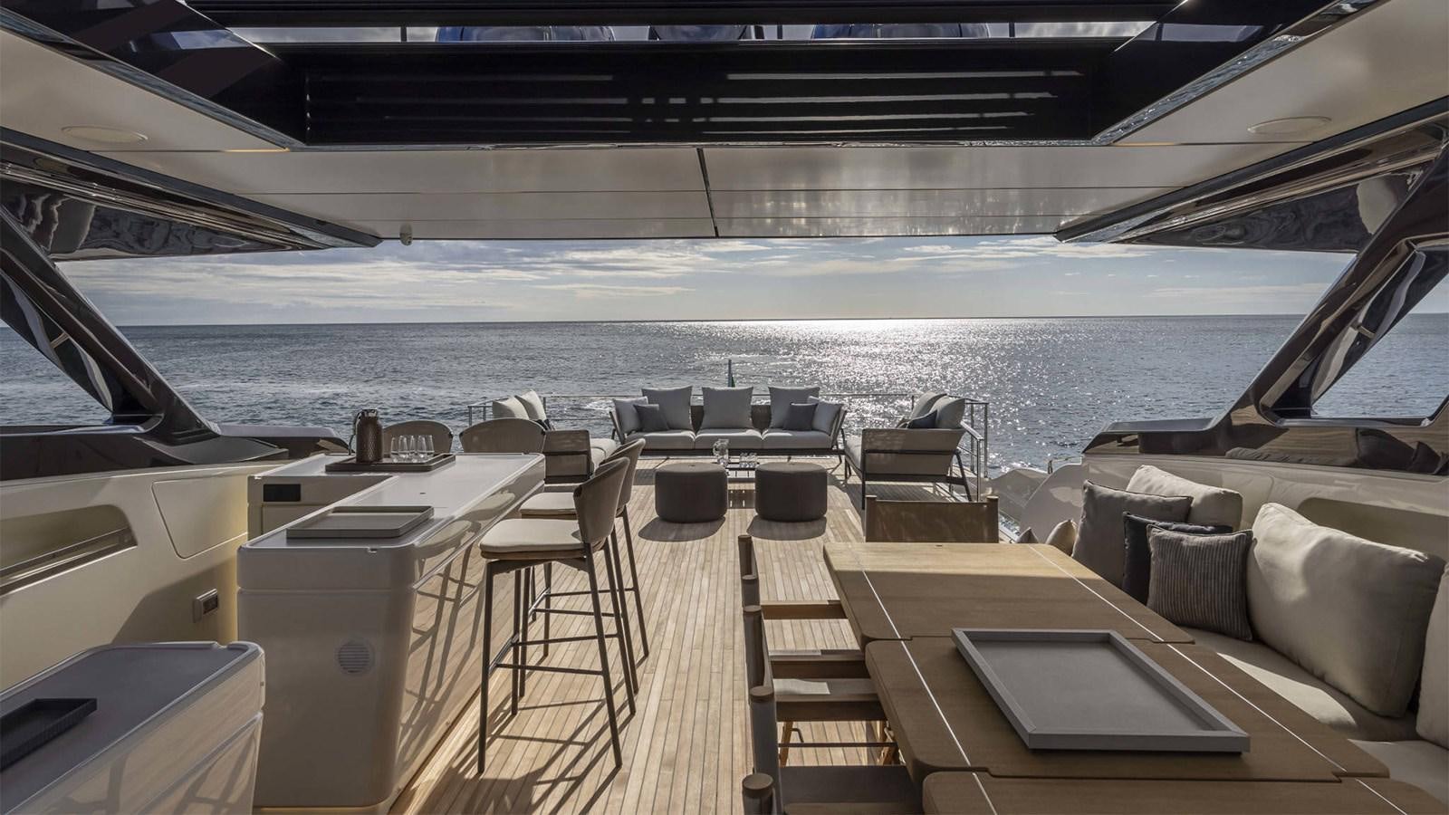a deck with a view of the water and the deck aboard FERRETTI 1000 Yacht for Sale