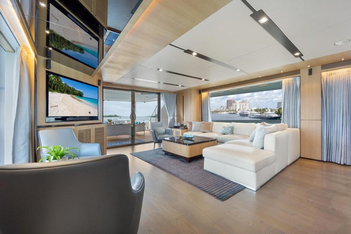 a living room with a large ceiling aboard BELLA TU Yacht for Sale