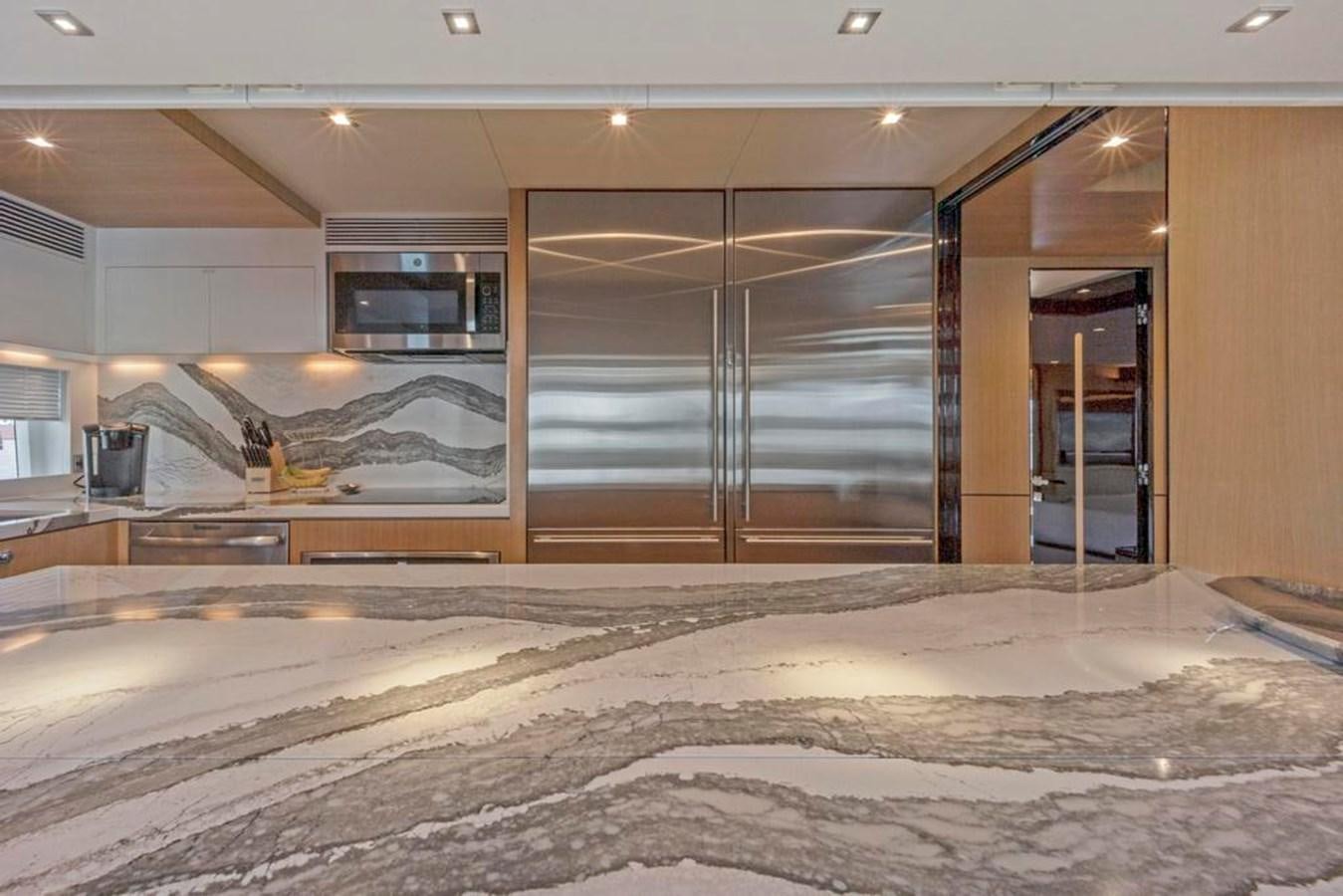 a large bathroom with a large jacuzzi aboard BELLA TU Yacht for Sale