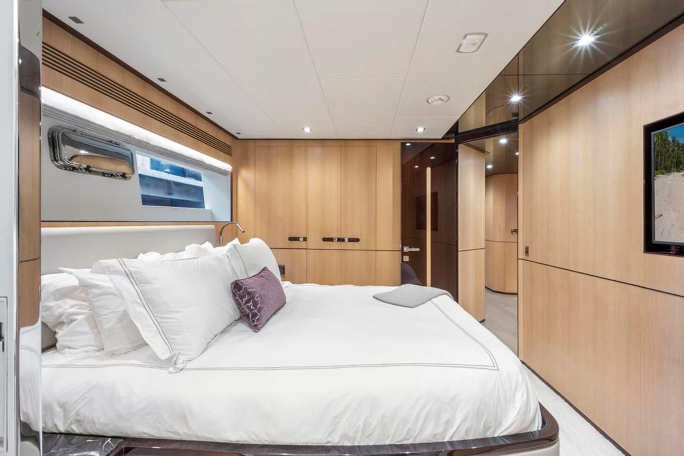 a bed in a room aboard BELLA TU Yacht for Sale