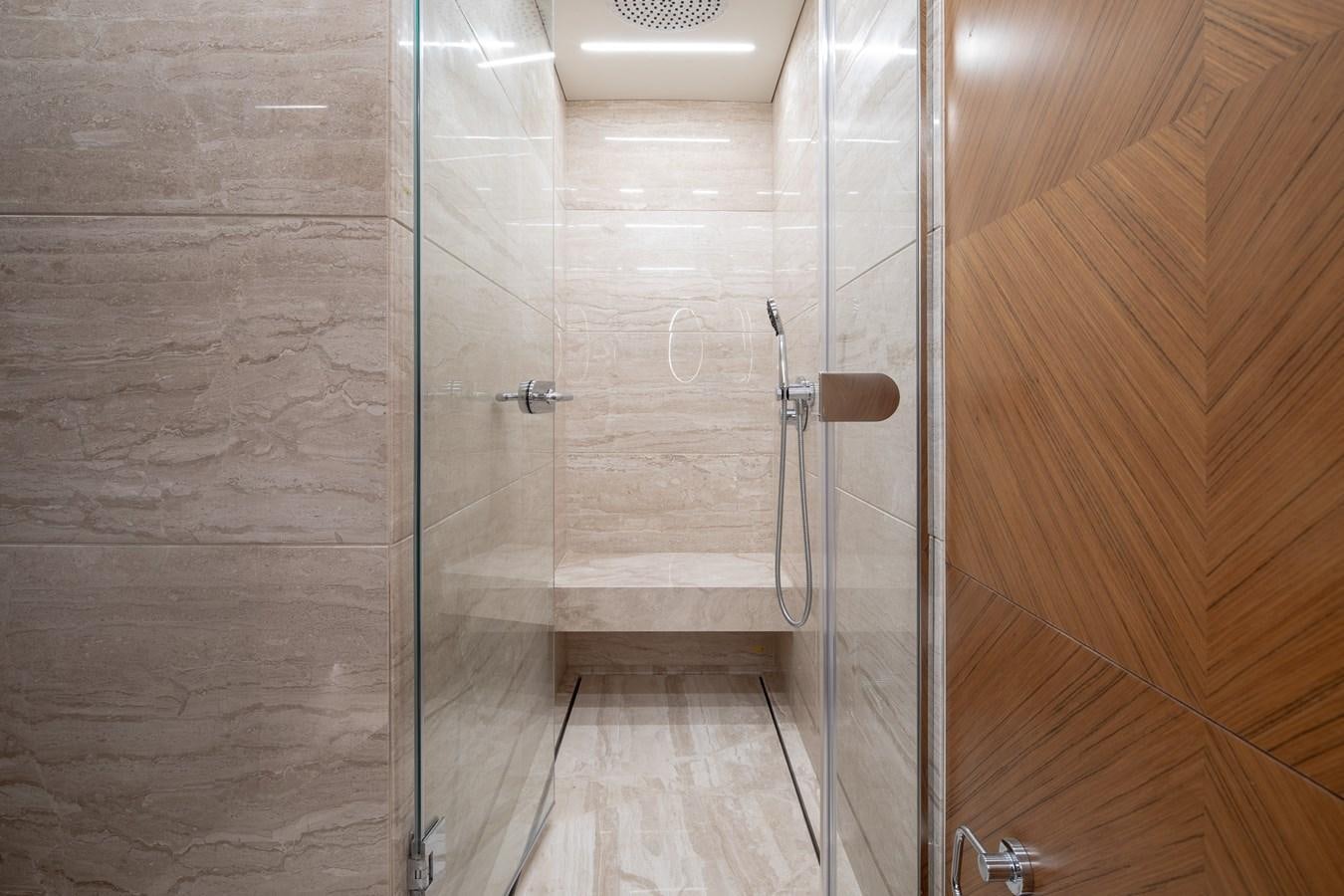 a bathroom with a shower aboard EZGY Yacht for Sale