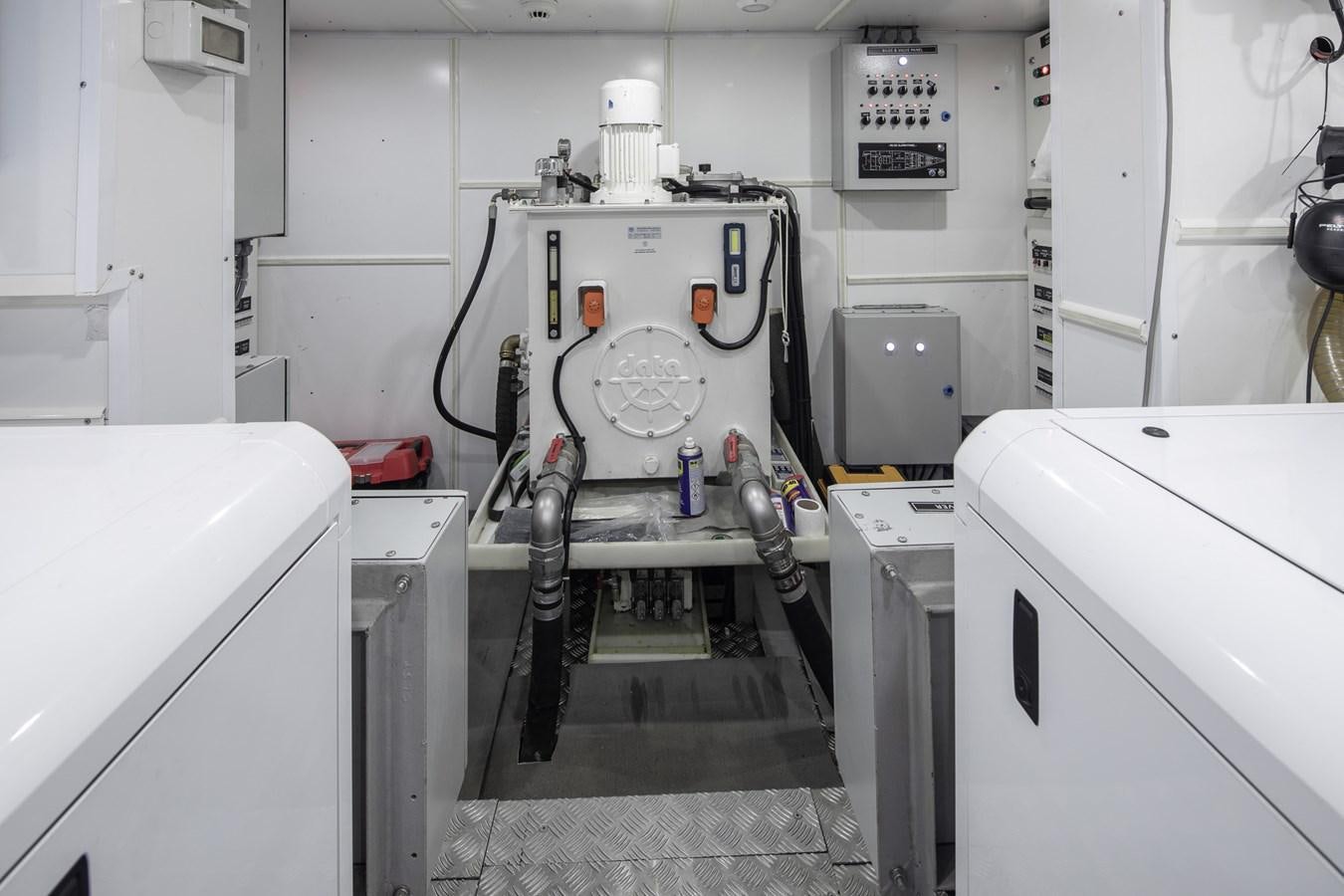 a machine in a room aboard EZGY Yacht for Sale