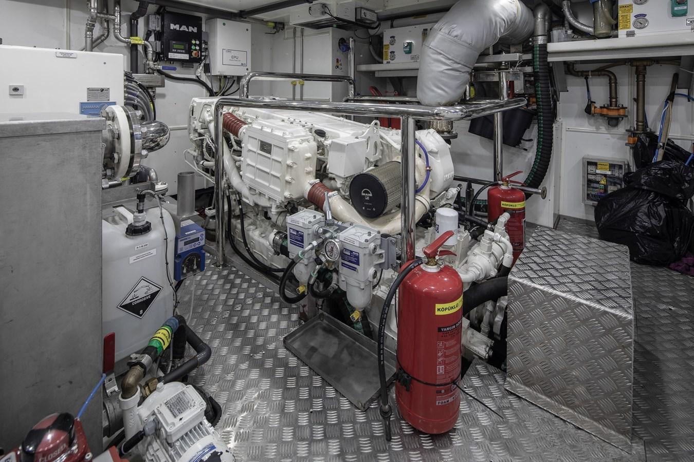 a machine with a red and white cylinder aboard EZGY Yacht for Sale