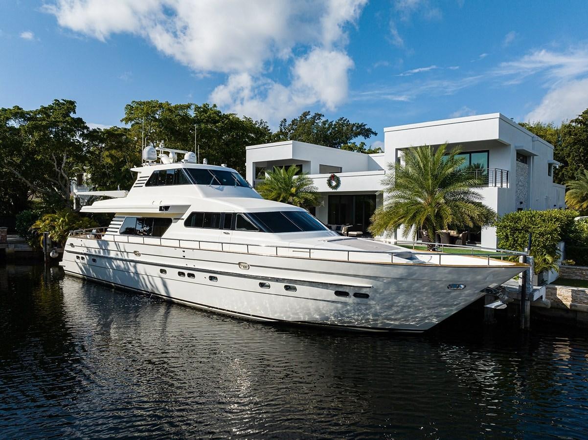 a white yacht docked aboard 82 Yacht for Sale