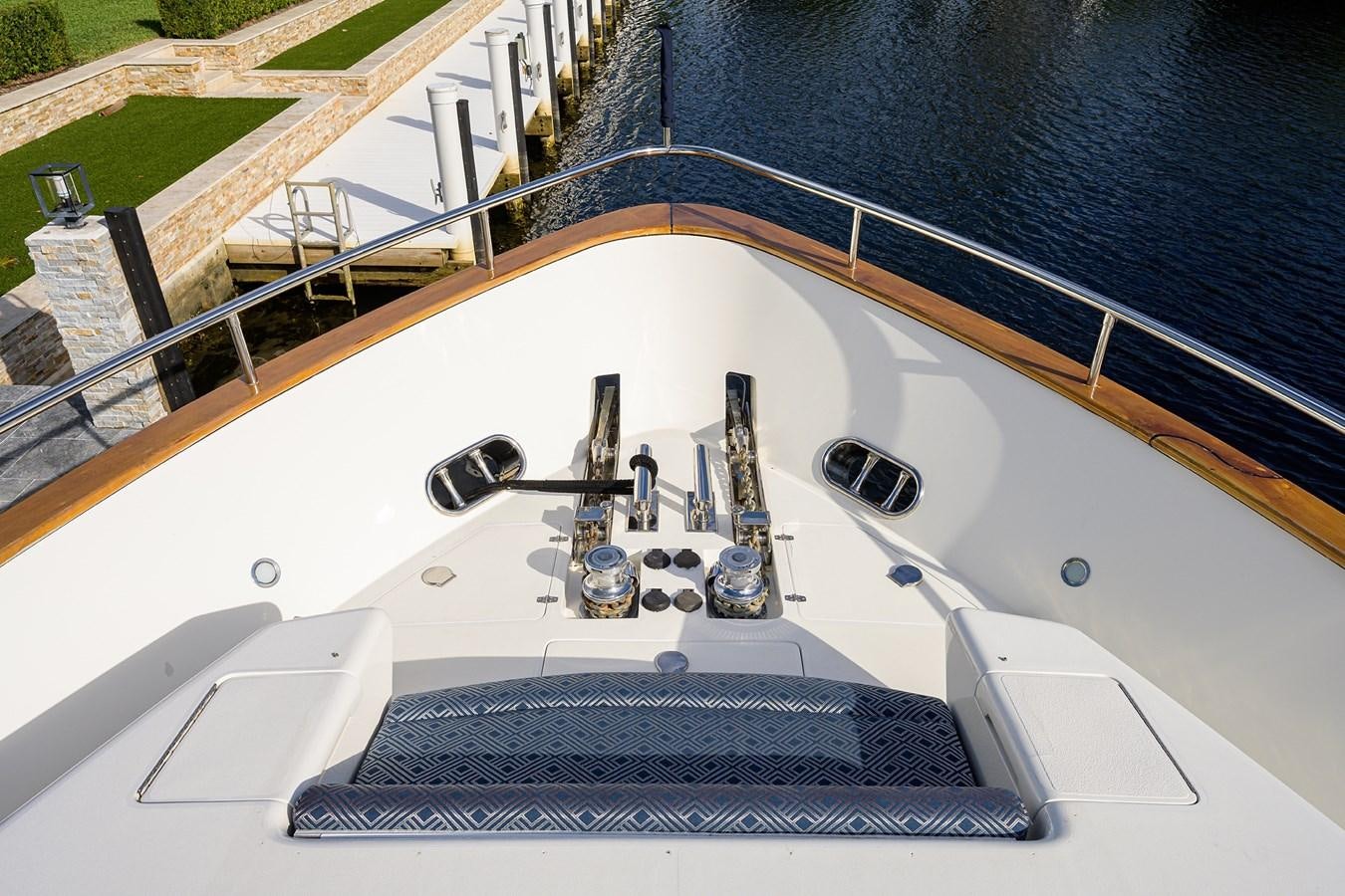 a white boat with a satellite dish aboard 82 Yacht for Sale