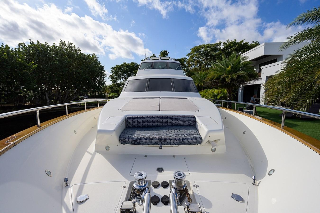 a white car with a black roof aboard 82 Yacht for Sale