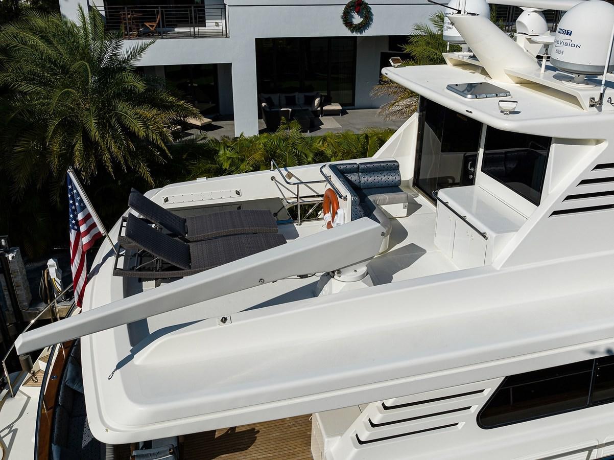 a row of white yachts aboard 82 Yacht for Sale
