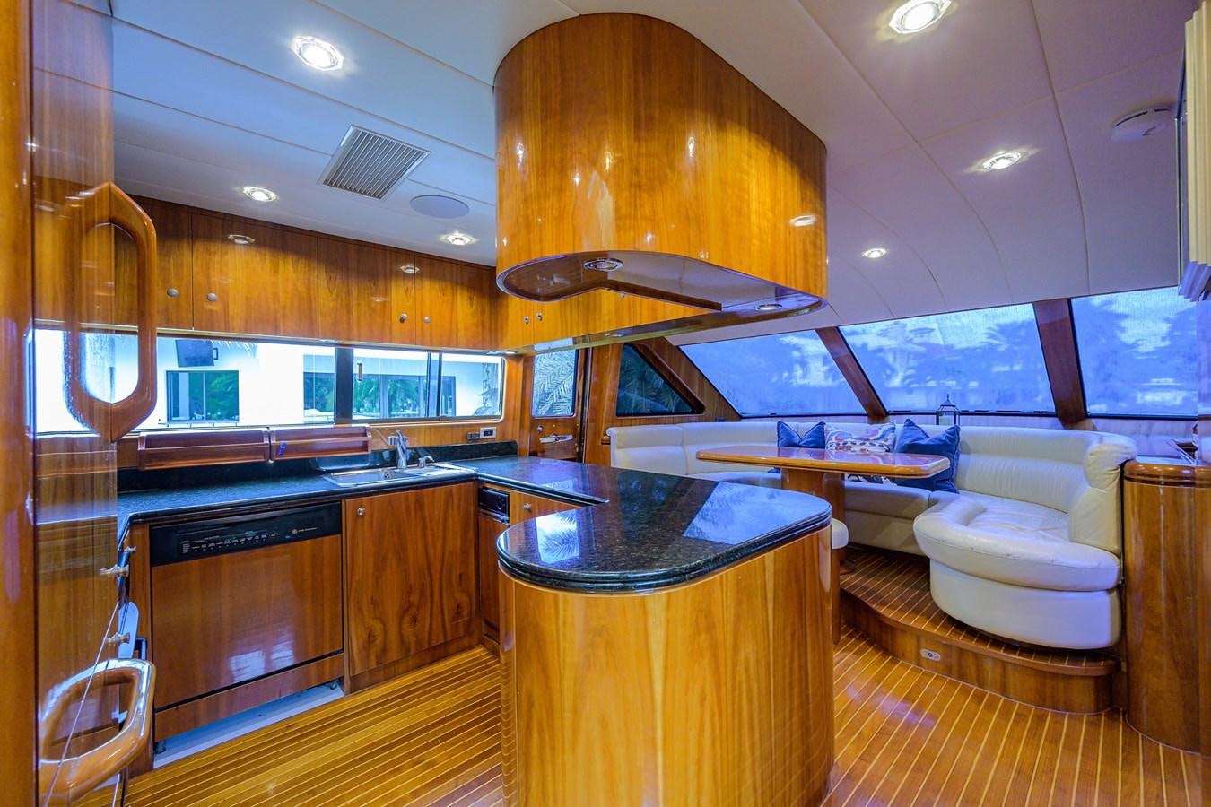 a kitchen with a large island aboard 82 Yacht for Sale